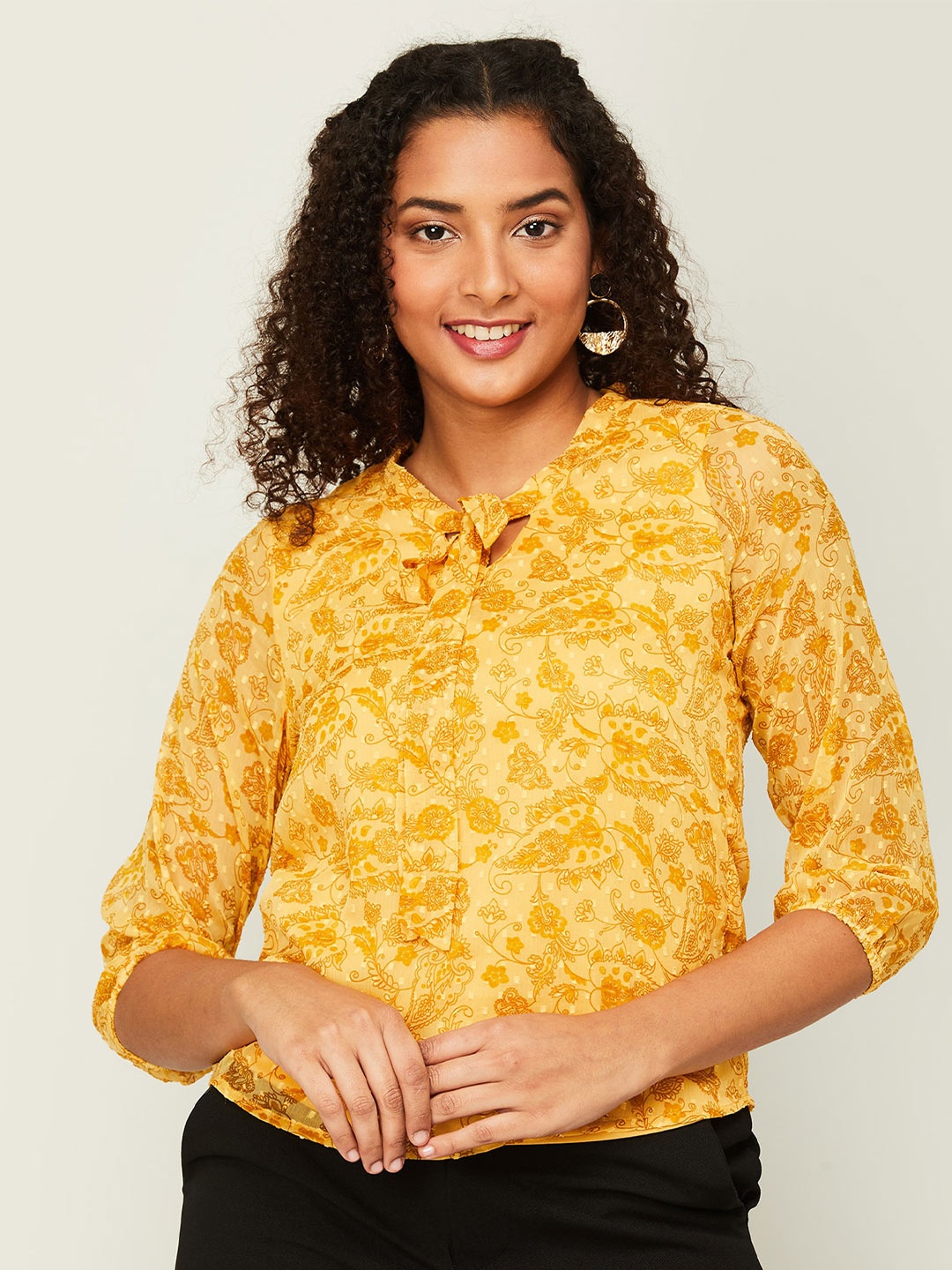 

CODE by Lifestyle Ethnic Motifs Printed Tie-Up Neck Top, Mustard