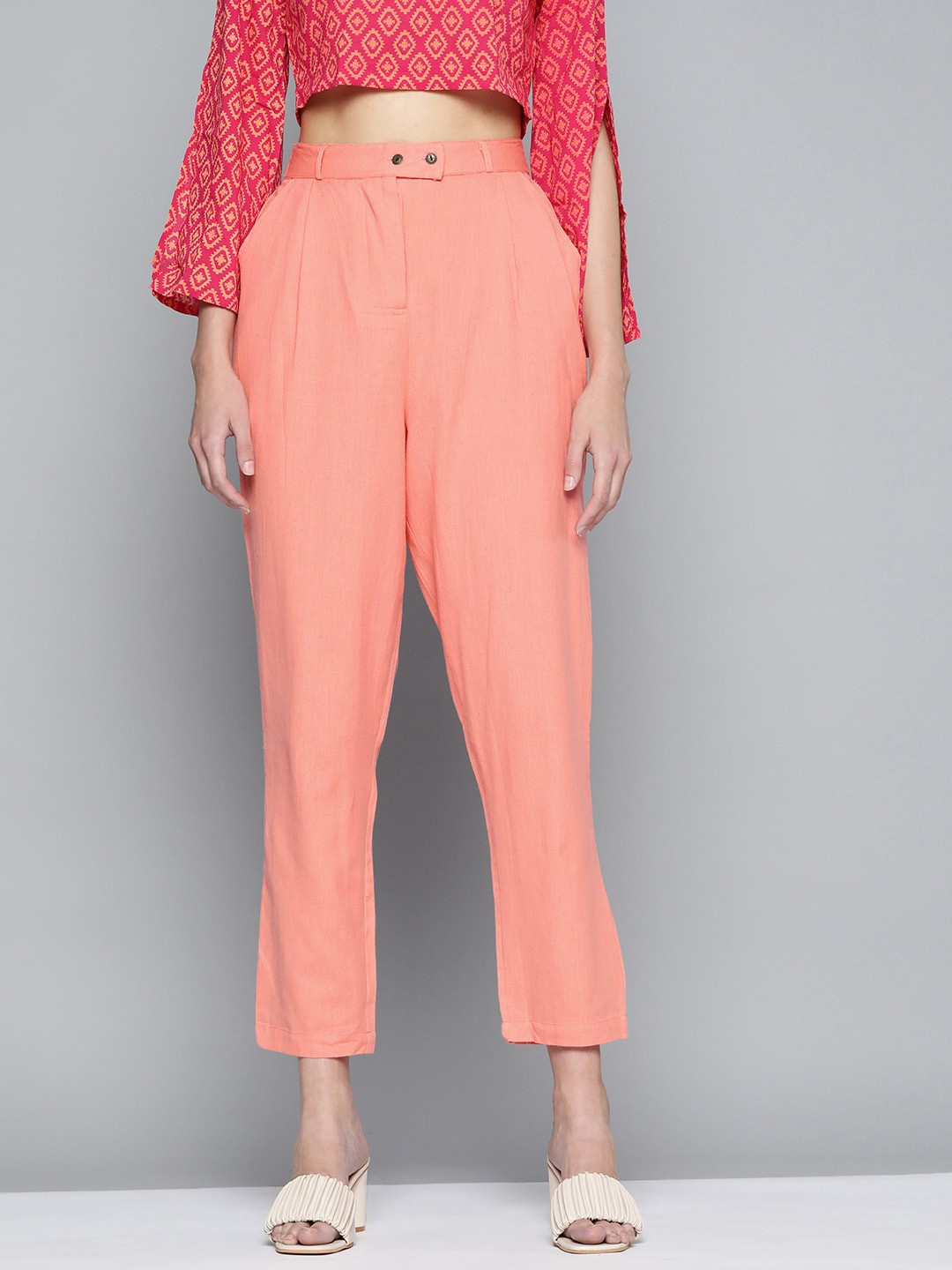 

MALHAAR Women Mid-Rise Cotton Straight Fit Cropped Pleated Trousers, Peach