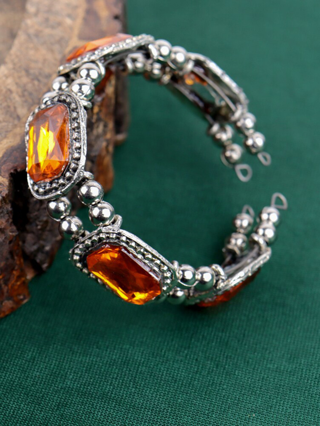 

Krelin Women German Silver Kundan Studded Brass-Plated Kada Bracelet, Orange