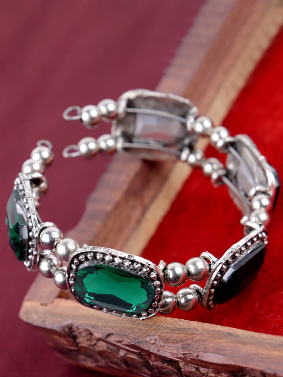 

Krelin Women Green German Silver Oxidised Brass-Plated Cuff Bracelet