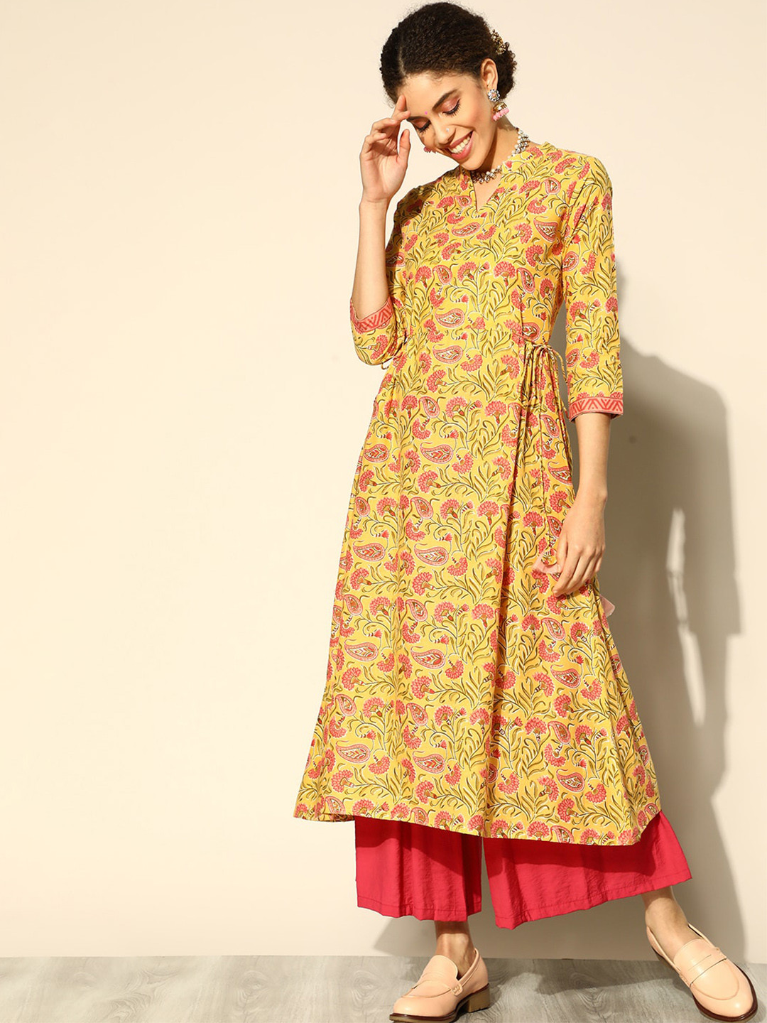 

Indo Era Women Paisley Printed A-Line Pleated Cotton Kurta, Mustard
