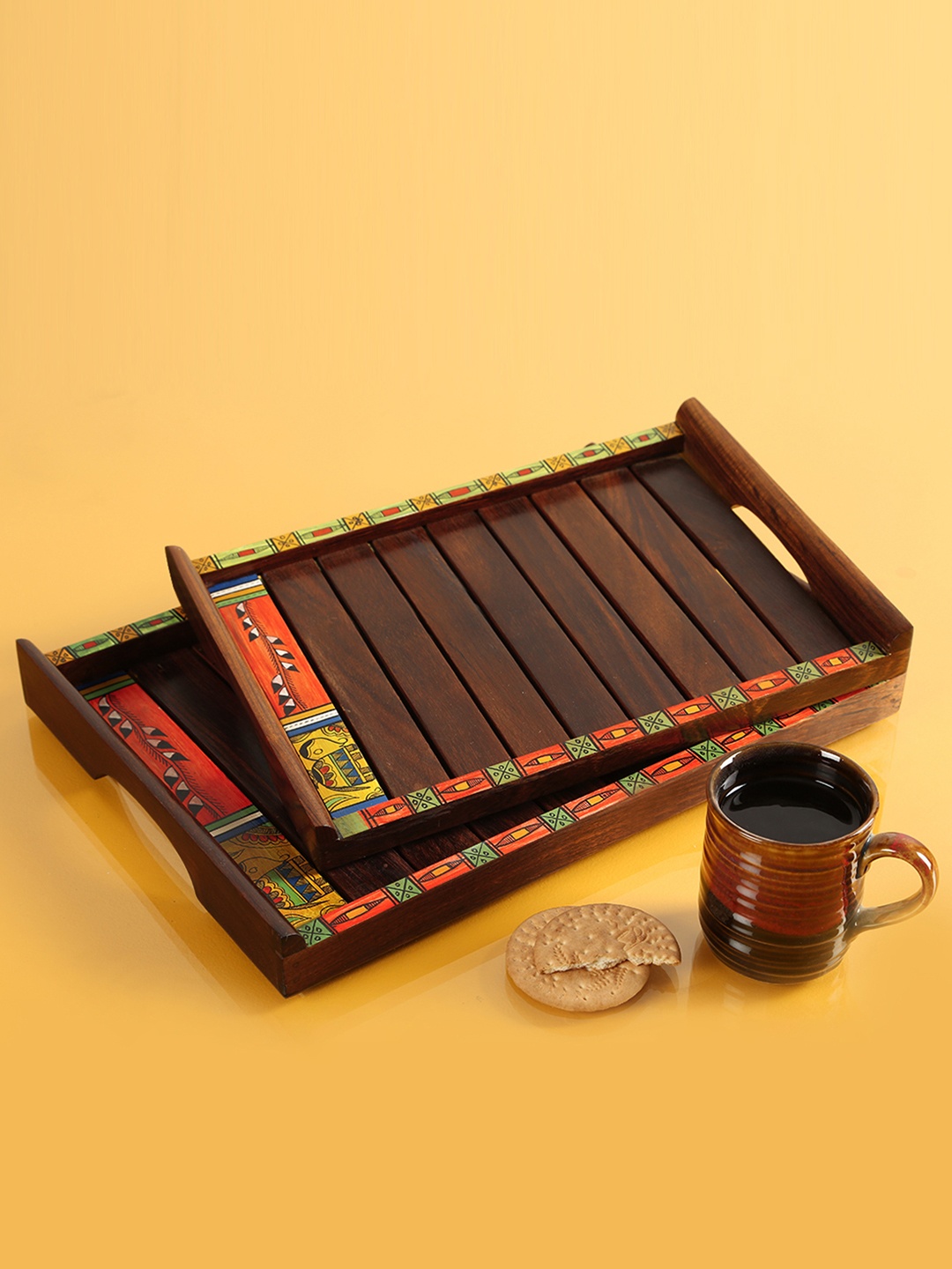 

ExclusiveLane Brown 2 Pieces Hand-Painted Madhubani Wooden Tray Set