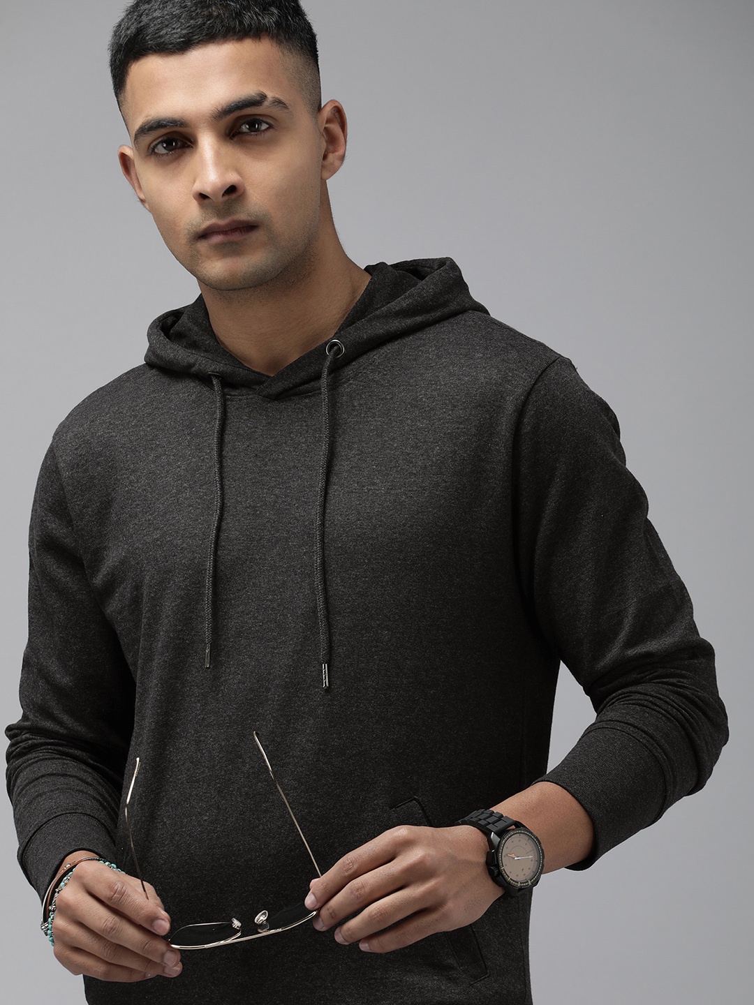 

Roadster Men Solid Hooded Sweatshirt, Charcoal