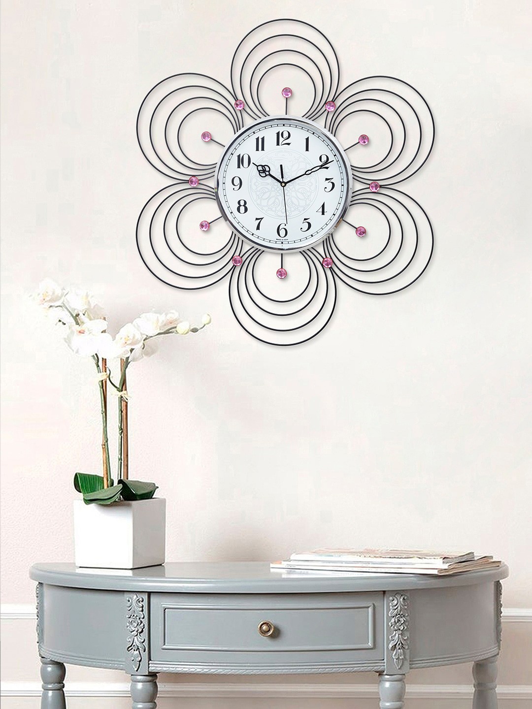 

eCraftIndia Pink & Blue Printed Floral Contemporary Wall Clock