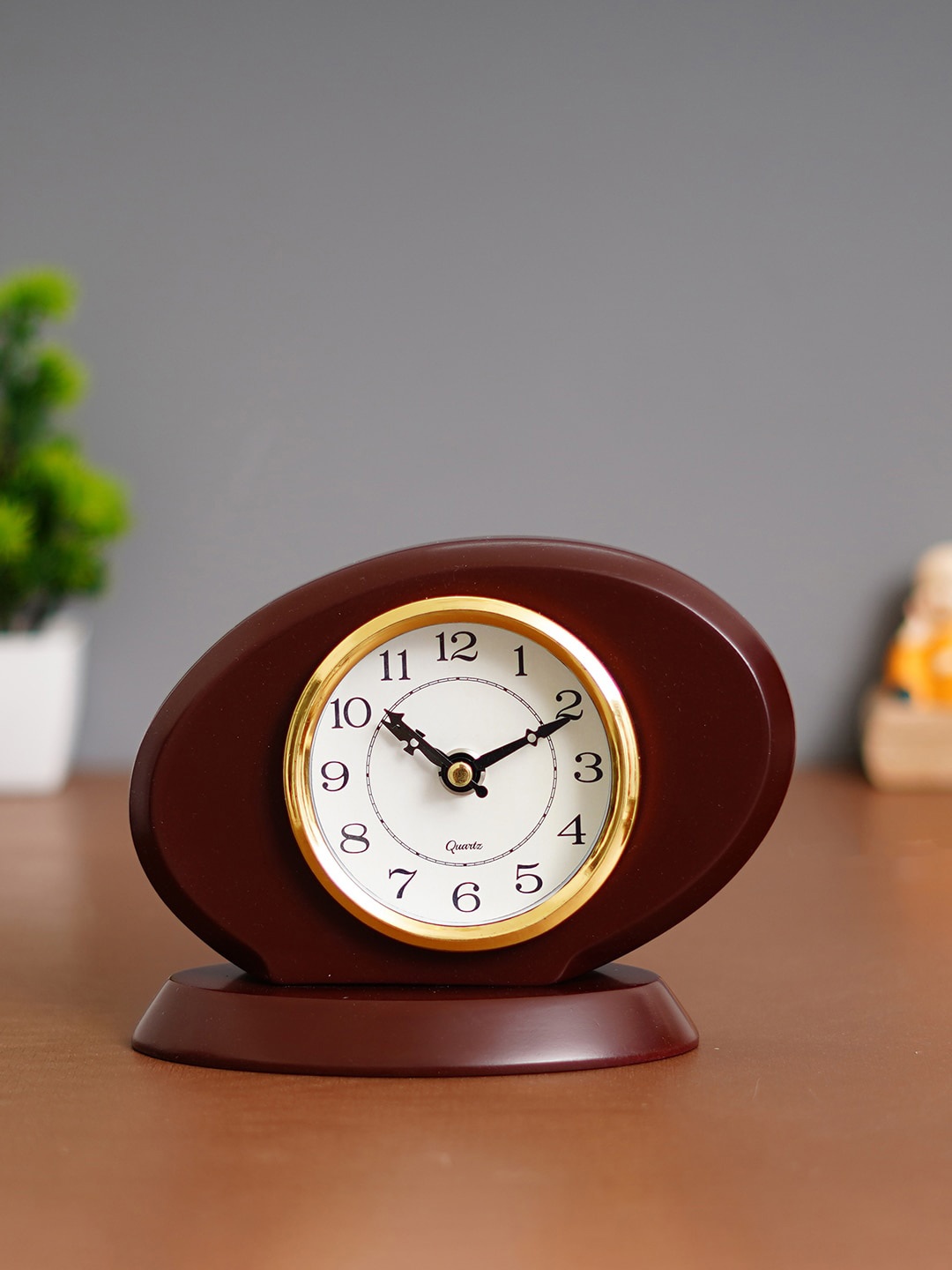 

eCraftIndia Brown & White Oval Analogue Striking Movement Traditional Table Clock