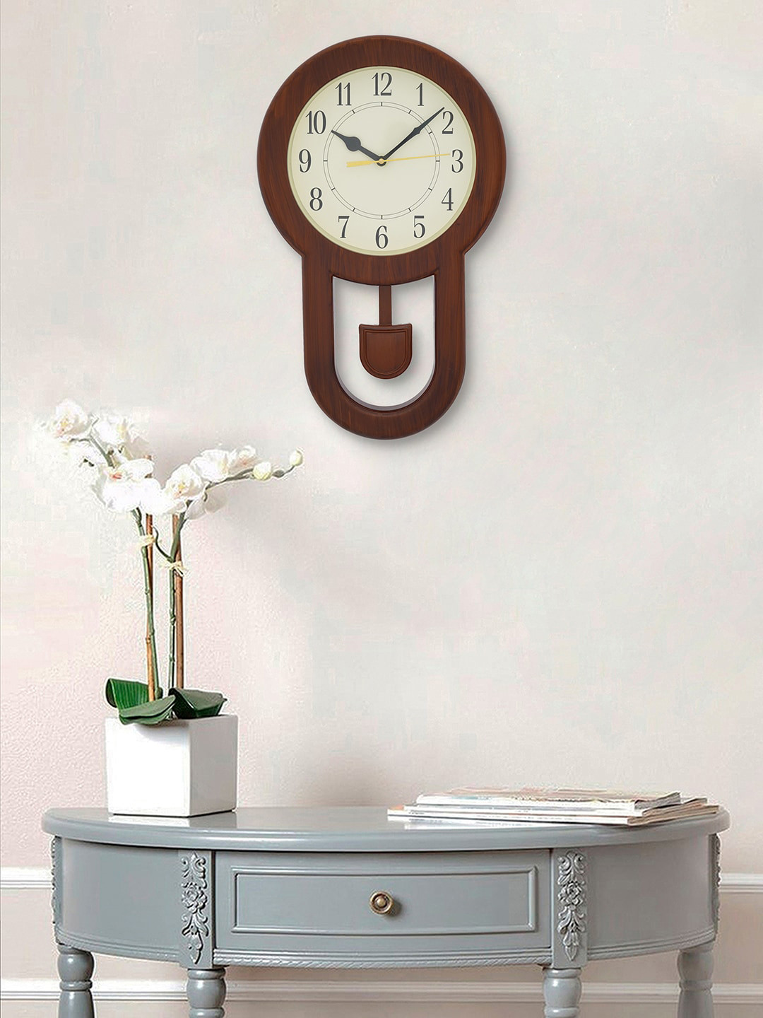

eCraftIndia Brown & Cream-Coloured Analogue Traditional Wall Clock