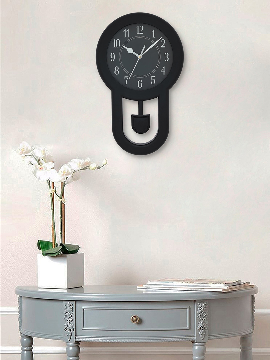 

eCraftIndia Black & White Analogue Sweep Movement Traditional Wall Clock