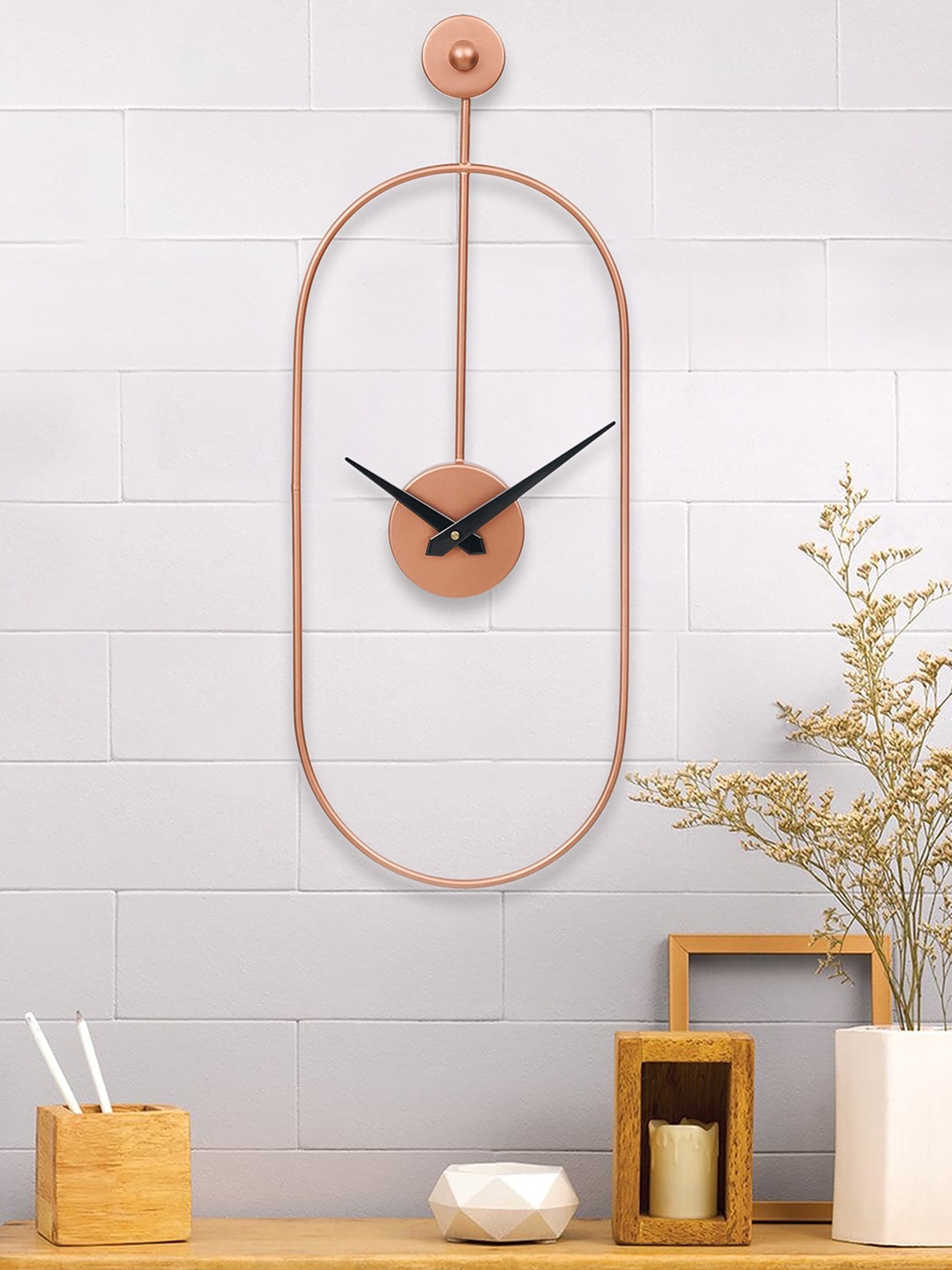 

eCraftIndia Copper-Toned & Black Oval Analogue Contemporary Wall Clock