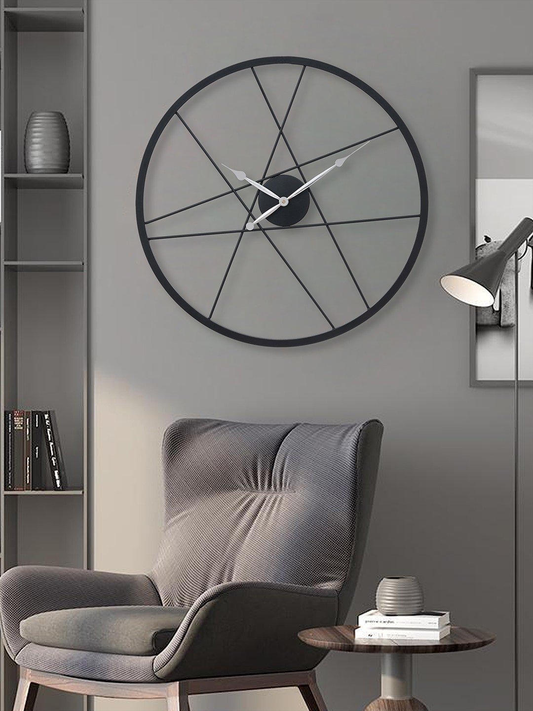 

eCraftIndia Black Round Analogue Contemporary Wall Clock