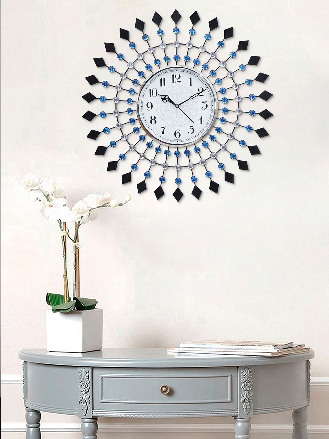 

eCraftIndia Blue & Black Embellished Floral Analogue Contemporary Wall Clock