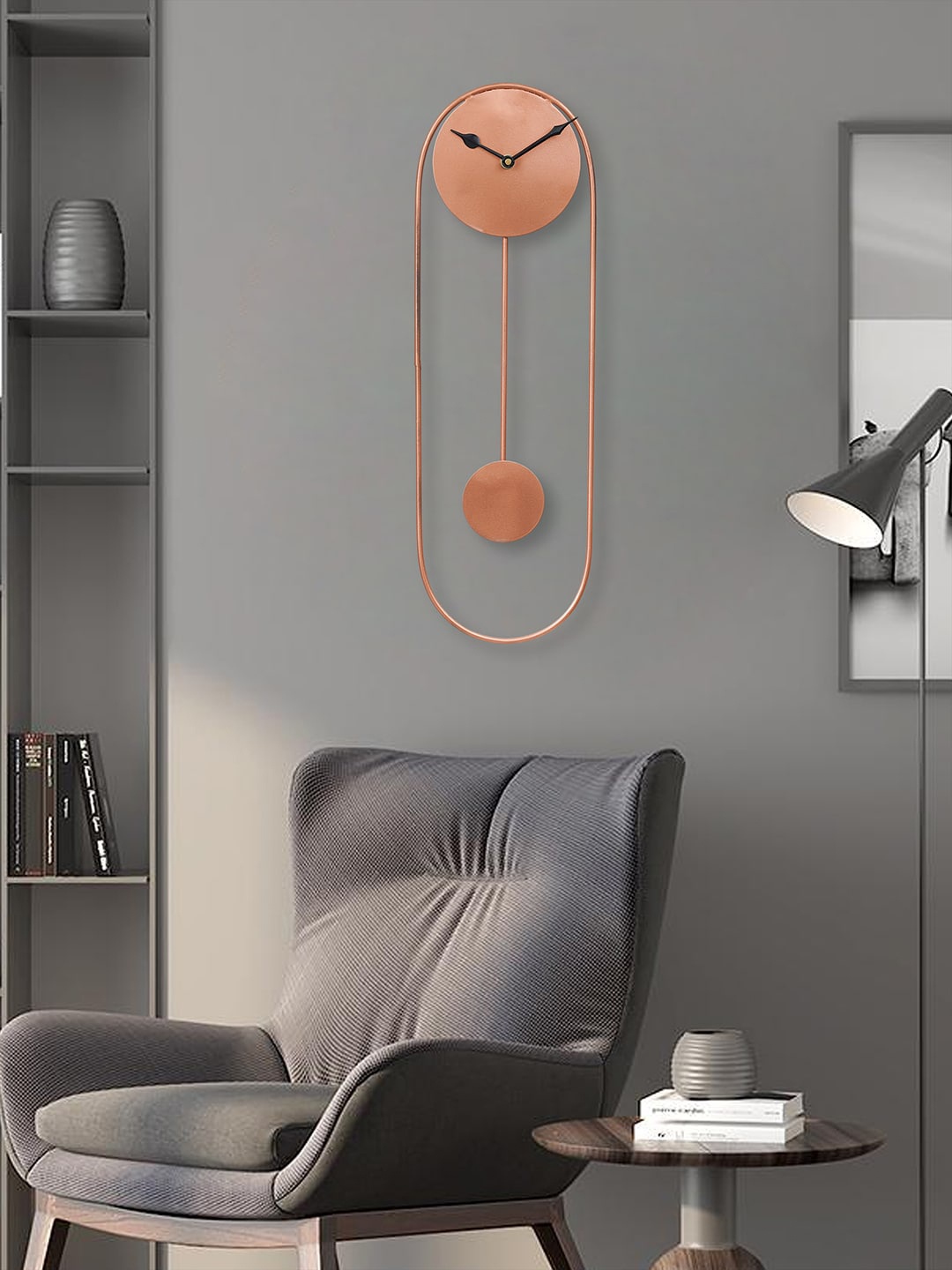 

eCraftIndia Copper-Toned & Black Oval Analogue Contemporary Wall Clock
