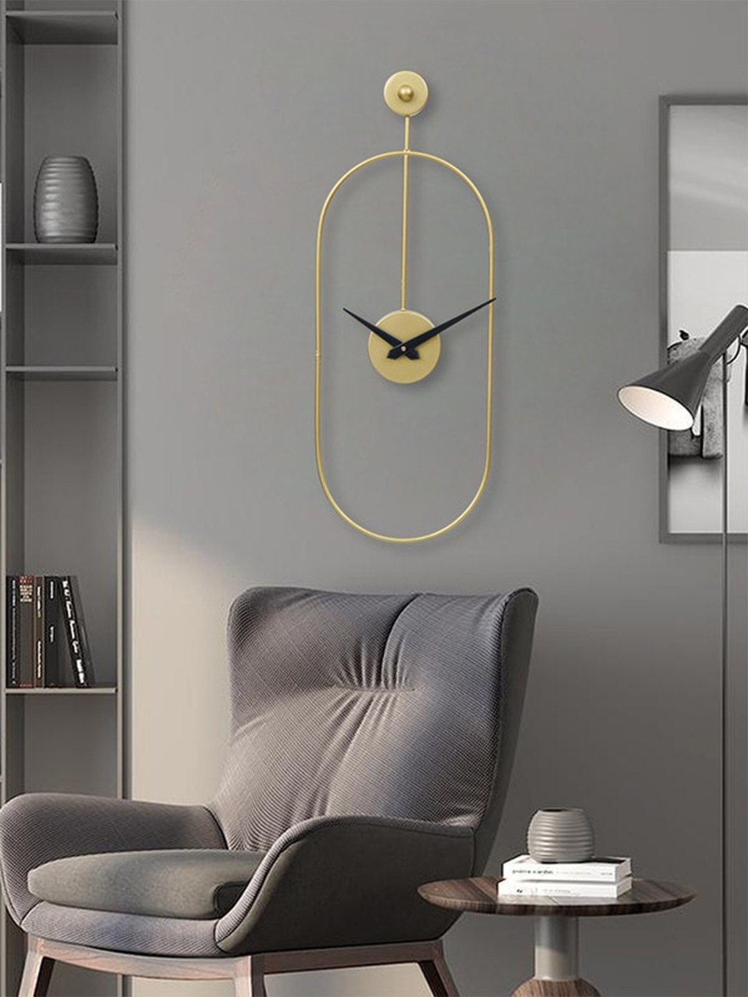 

eCraftIndia Gold-Toned & Black Oval Analogue Contemporary Wall Clock