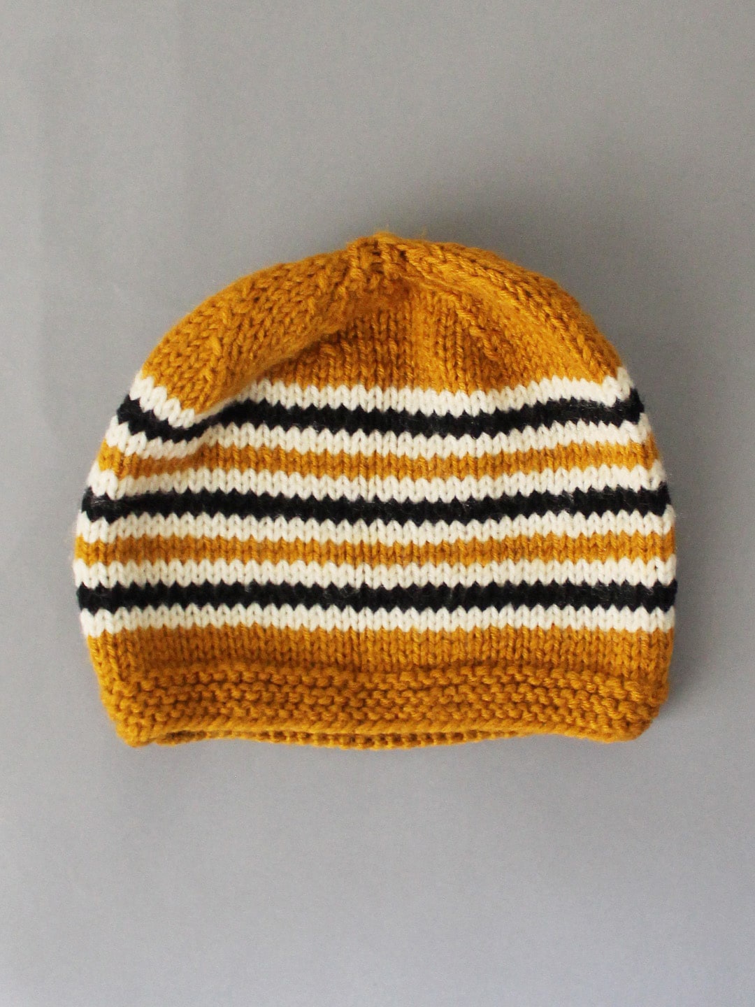 

Woonie Infant Self Design Handmade Striped Pattern Acrylic Cap, Mustard