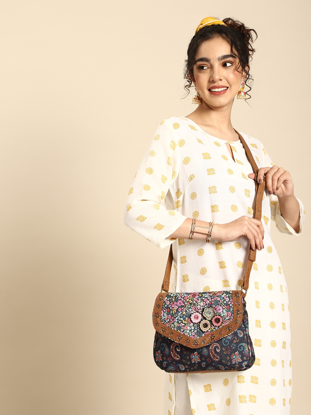 

Sangria Floral Printed Sling Bag with Cut Work, Navy blue