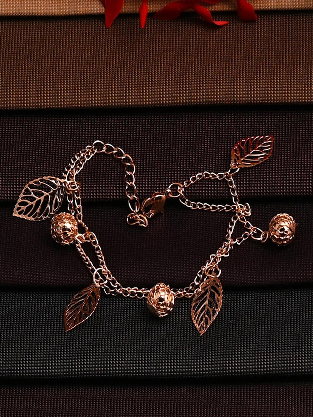 

Jewelz Women Gold Plated Link Bracelet with hanging leaf ensembles