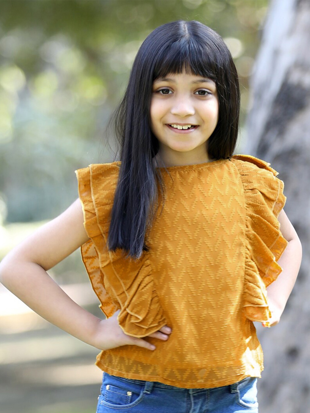 

Cutiekins Girls Self Design Ruffles Top, Mustard