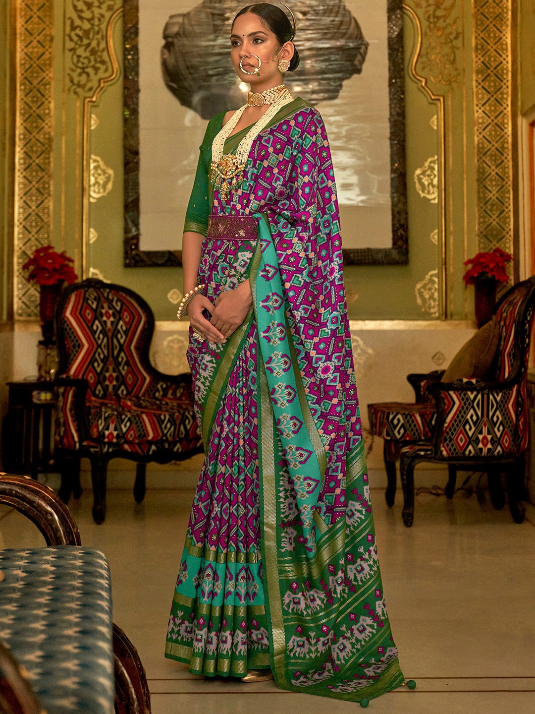 

Anouk Ethnic Motifs Printed Patola Saree, Magenta