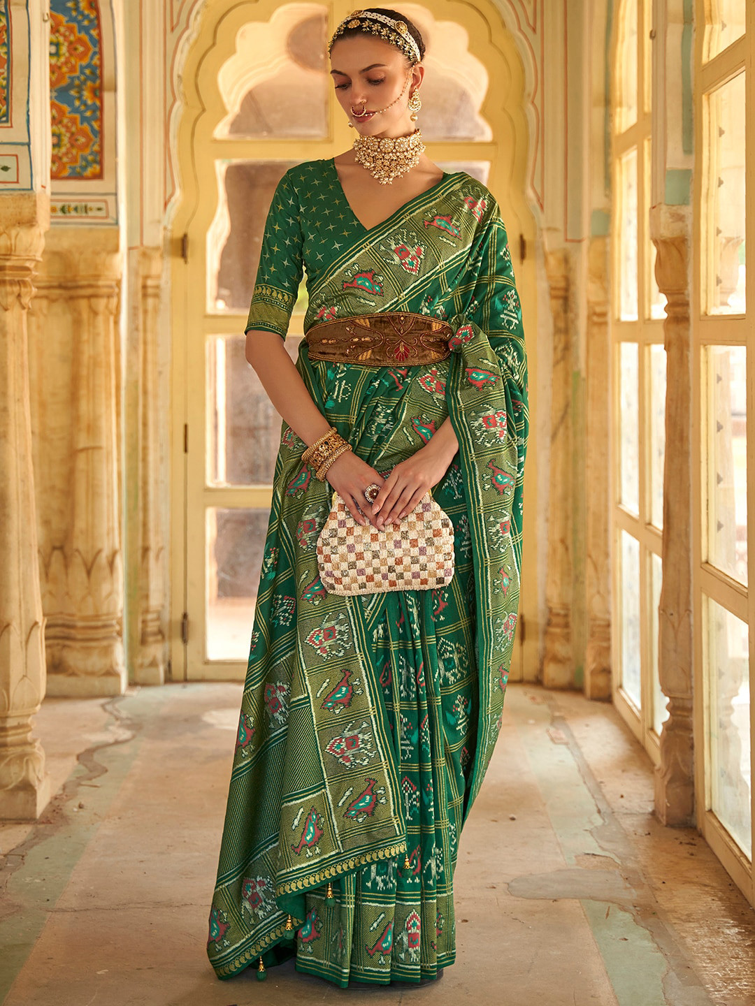 

Anouk Ethnic Motifs Woven Design Zari Patola Saree, Green