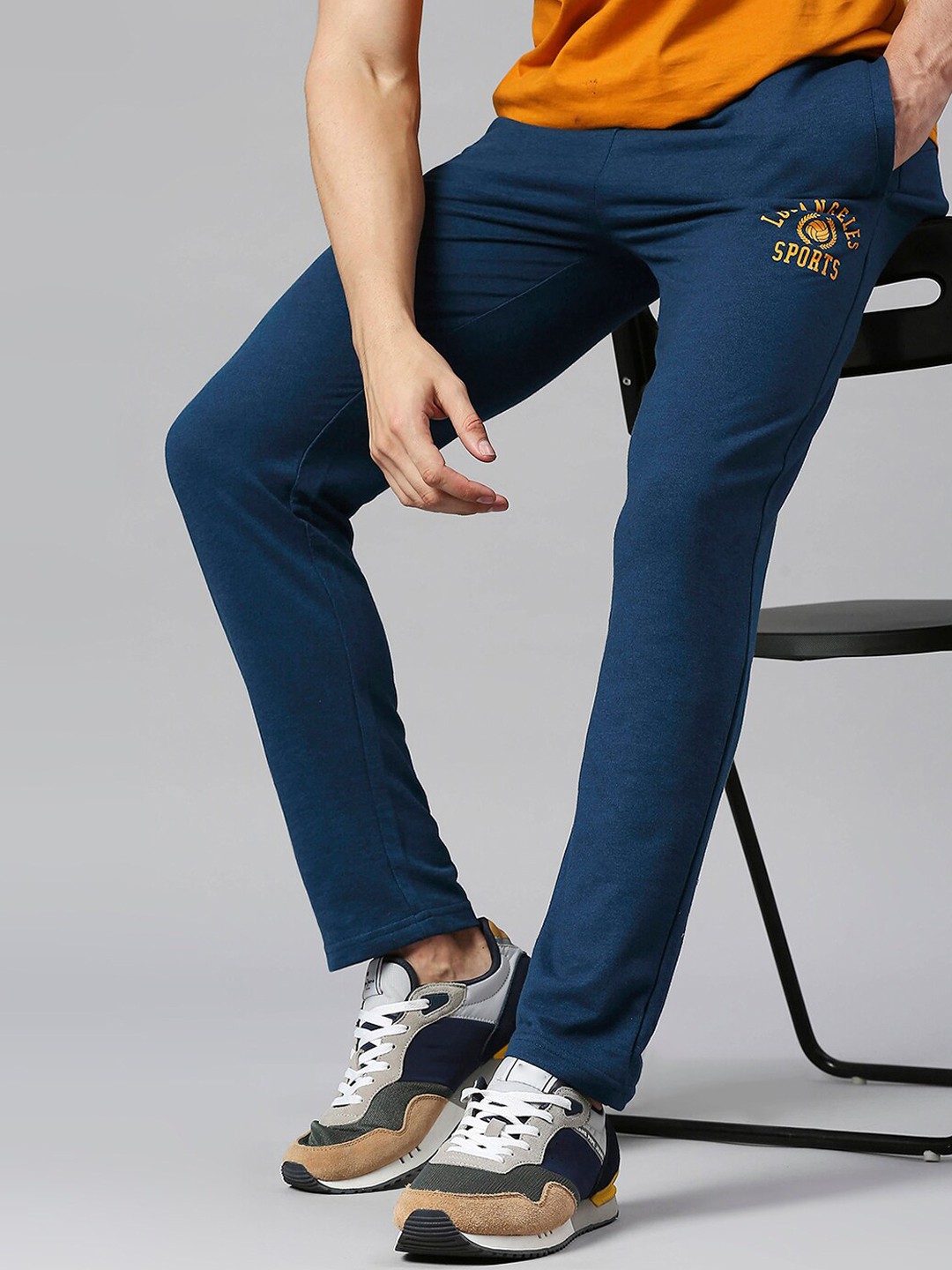 

Hubberholme Men Regular Fit Mid-Rise Track Pants, Teal