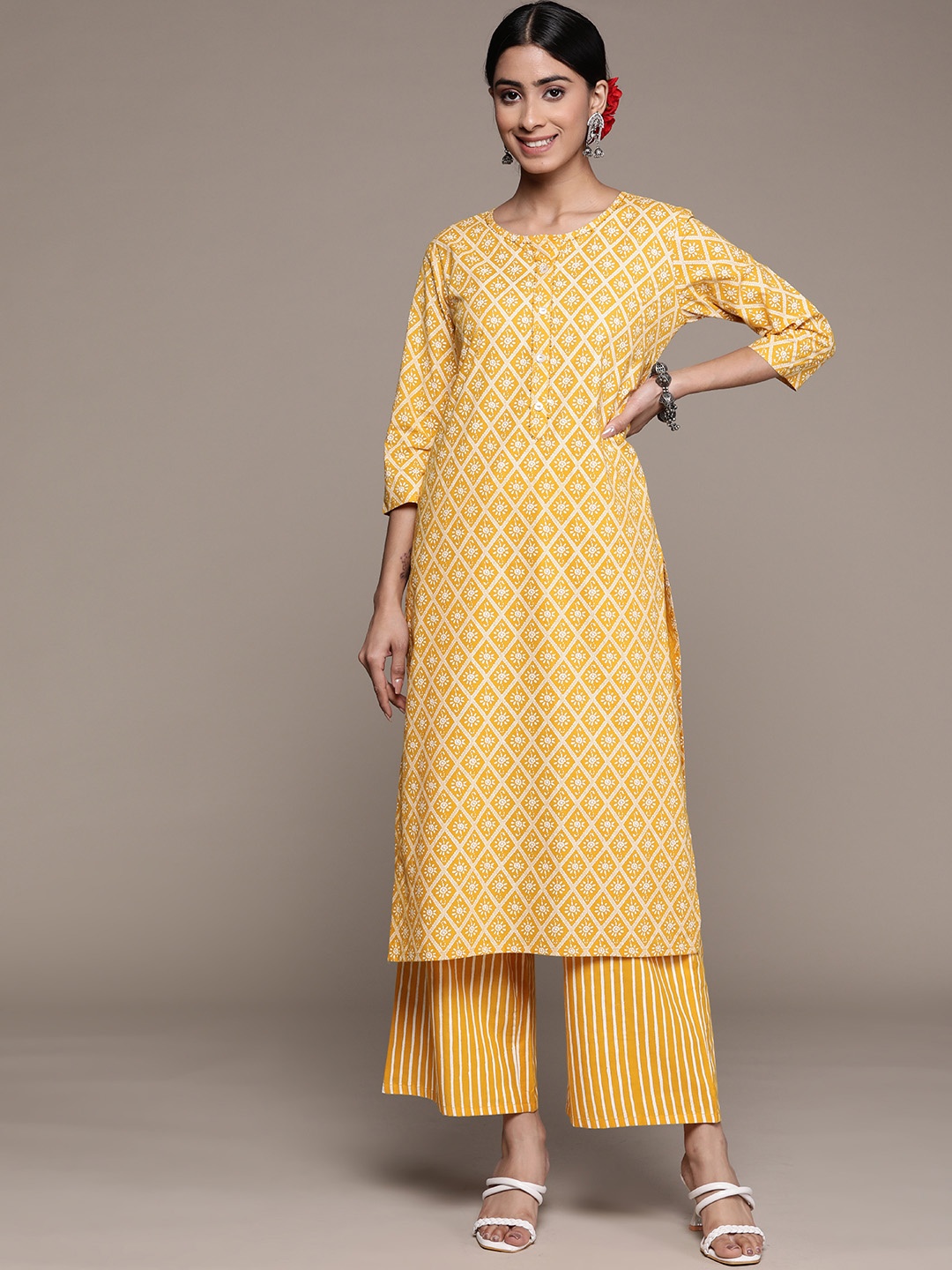 

Anubhutee Ethnic Motifs Printed Sequinned Pure Cotton Kurta with Trousers, Mustard