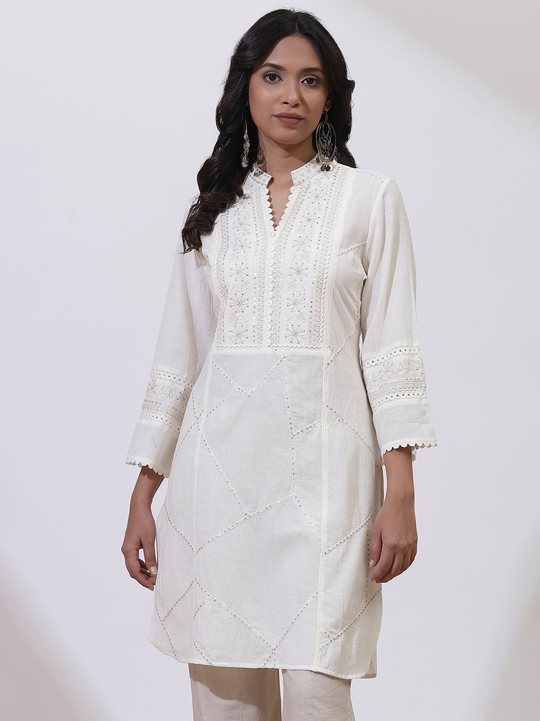 

Lakshita Ethnic Motifs Embroidered Sequinned Pure Cotton Thread Work Kurti, White