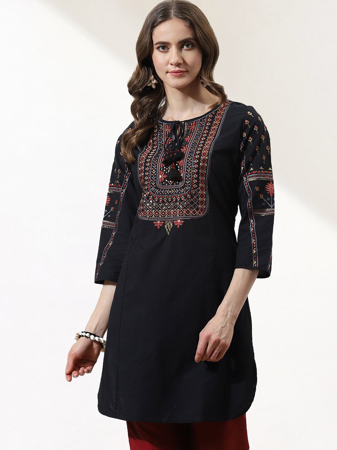 

Lakshita Plus Size Ethnic Motifs Embroidered Sequinned Tie Up Neck Pure Cotton Kurti, Black
