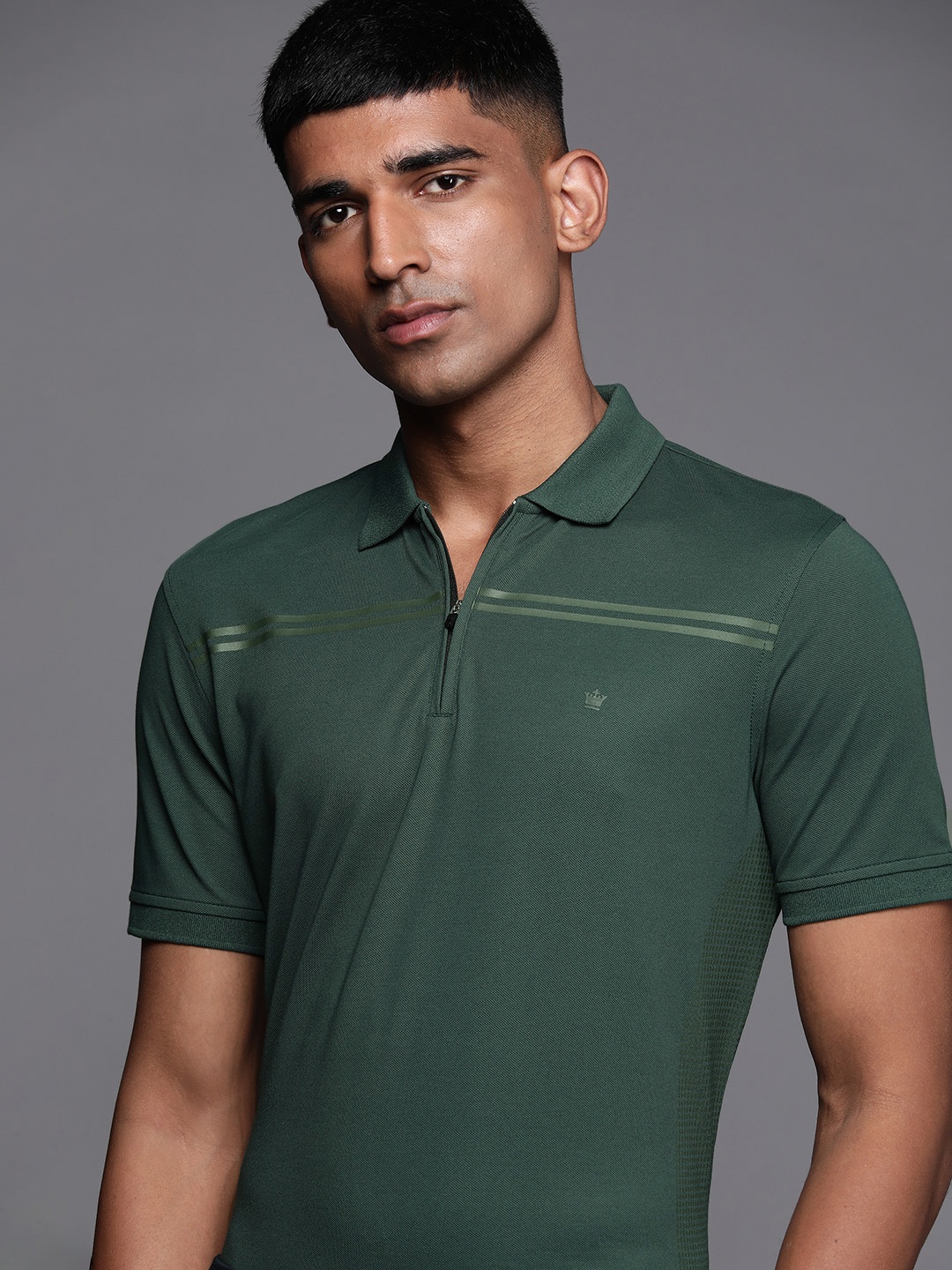 

Louis Philippe Men Solid Golf T-shirt, Green