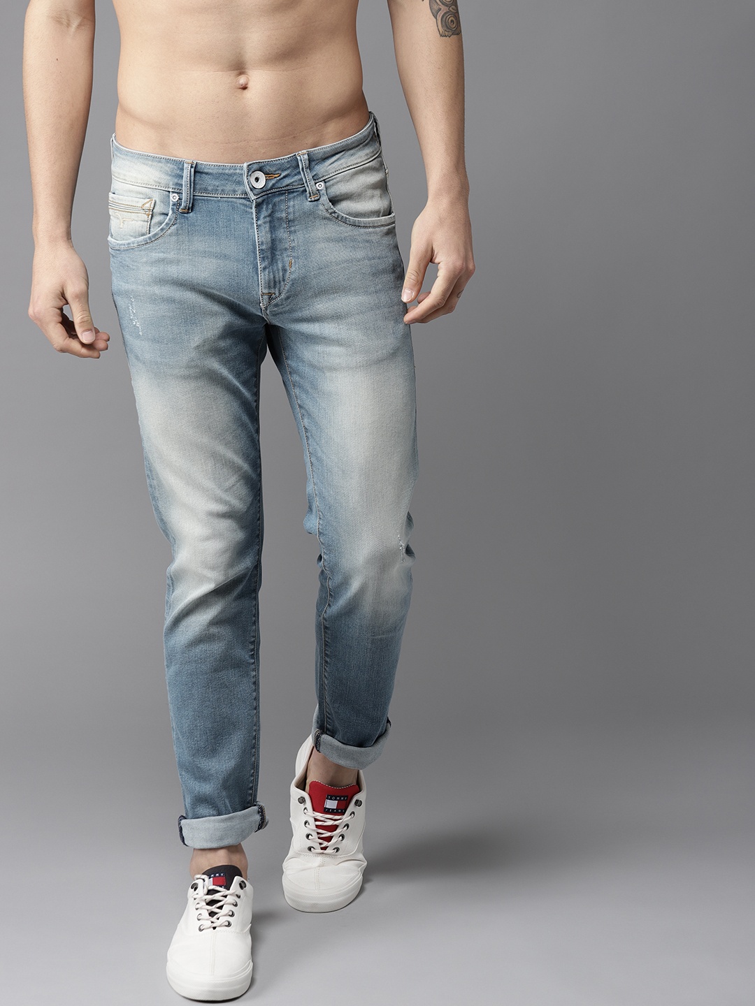 

Flying Machine Men Blue Tapered Fit Mid-Rise Low Distress Stretchable Jeans