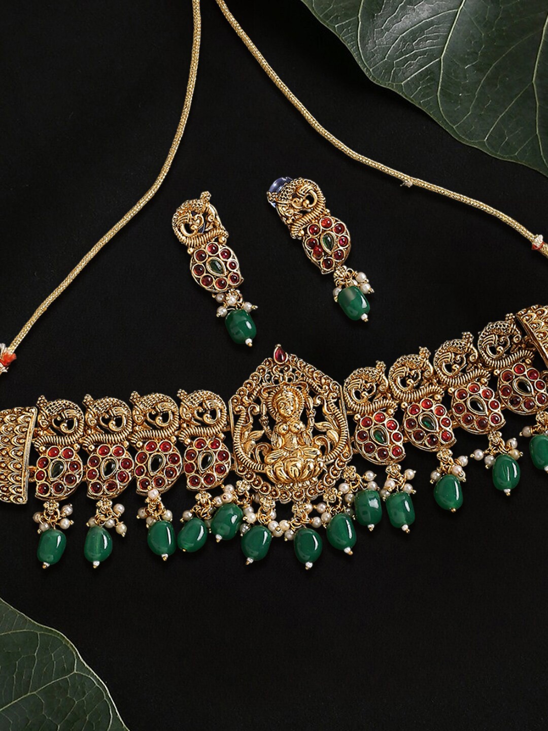 

OOMPH Gold-Plated Stone-Studded & Beaded Laxmi Choker Necklace Set