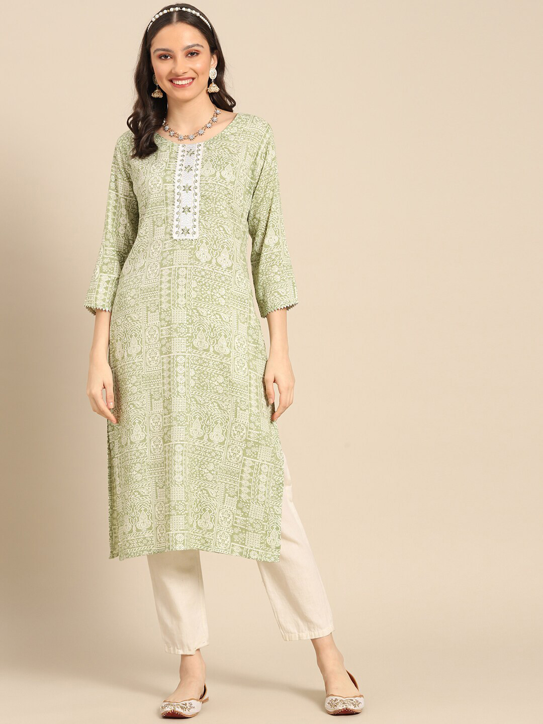 

Sangria Round Neck Ethnic Motifs Printed Thread Work Cotton Straight Kurta, Green