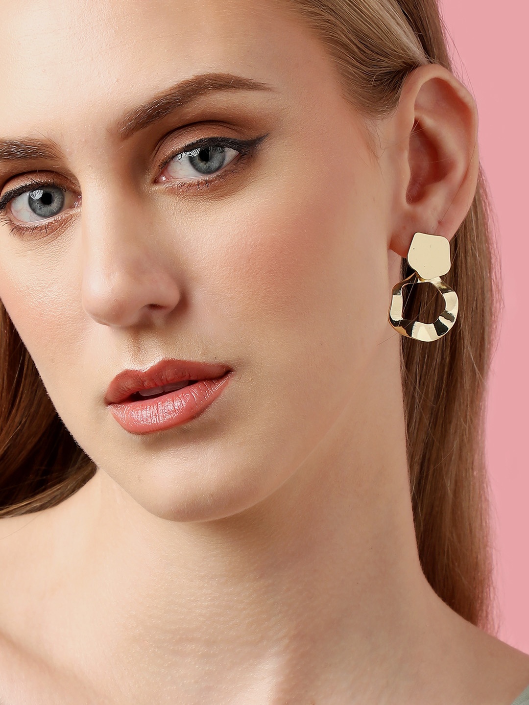 

SOHI Gold-Plated Contemporary Drop Earrings
