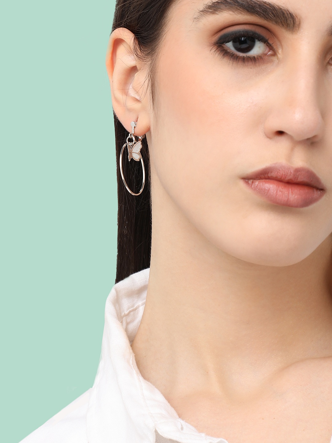 

SOHI Silver-Plated Contemporary Drop Earrings