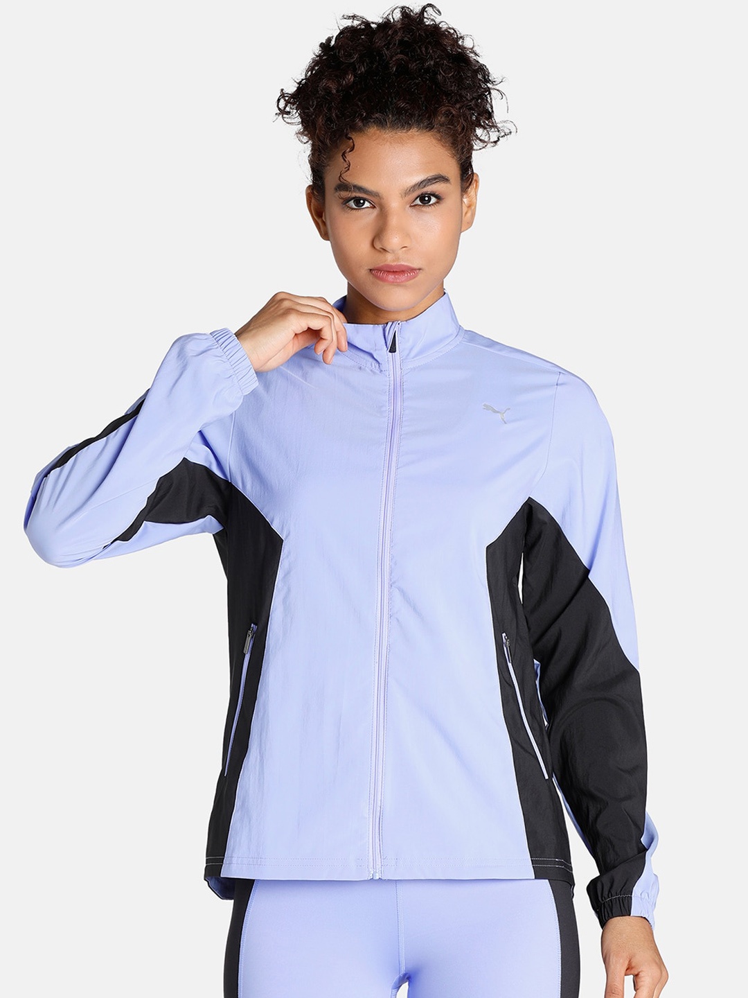 

Puma Women RUN FAVORITE WOVEN Colourblocked Sports Jacket, Purple