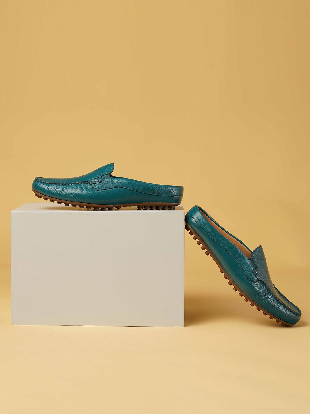 

Ruosh Men Textured Leather Loafers, Teal