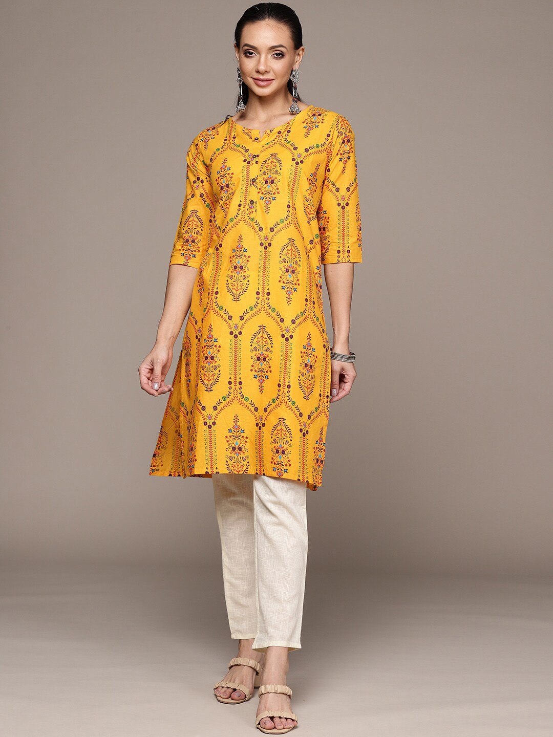 

Anubhutee Ethnic Motifs Printed Round Neck Cotton Kurta, Mustard