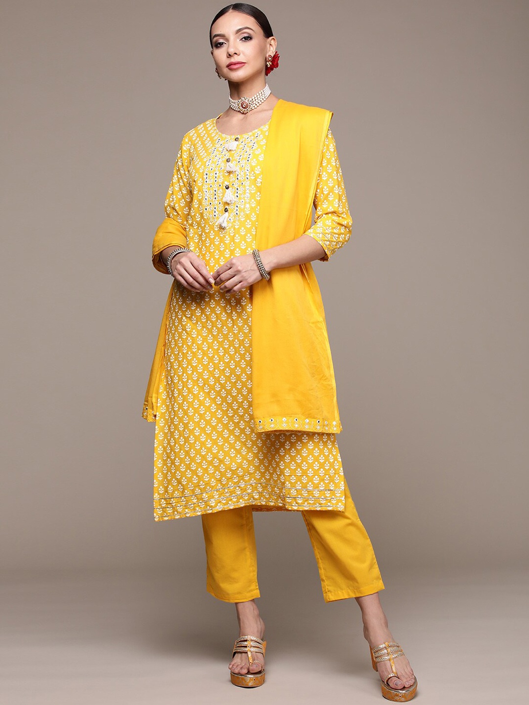 

Anubhutee Floral Printed Mirror Work Pure Cotton Kurta with Trousers & Dupatta, Yellow