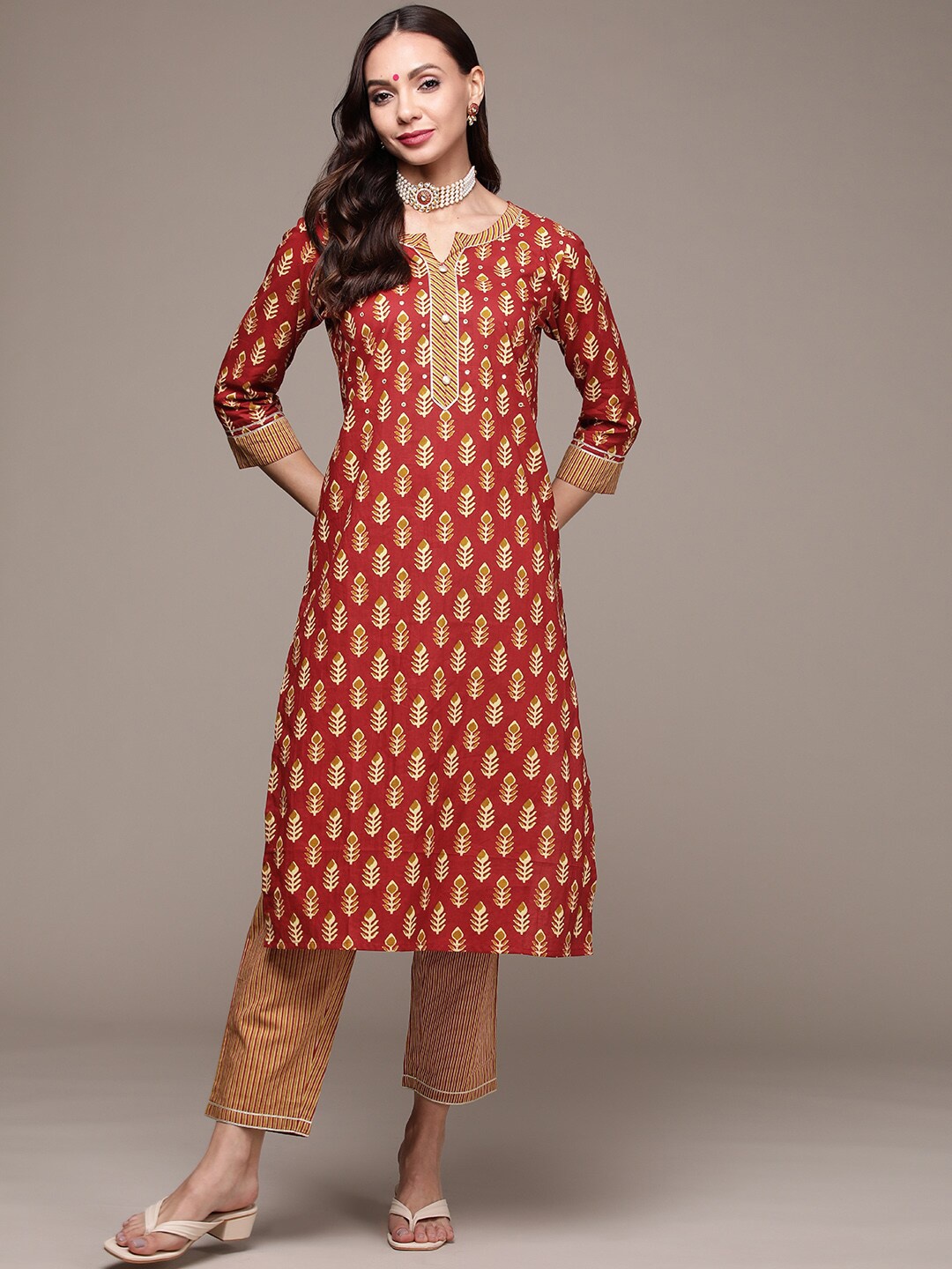 

Anubhutee Floral Printed Straight Pure Cotton Kurta with Trousers, Rust