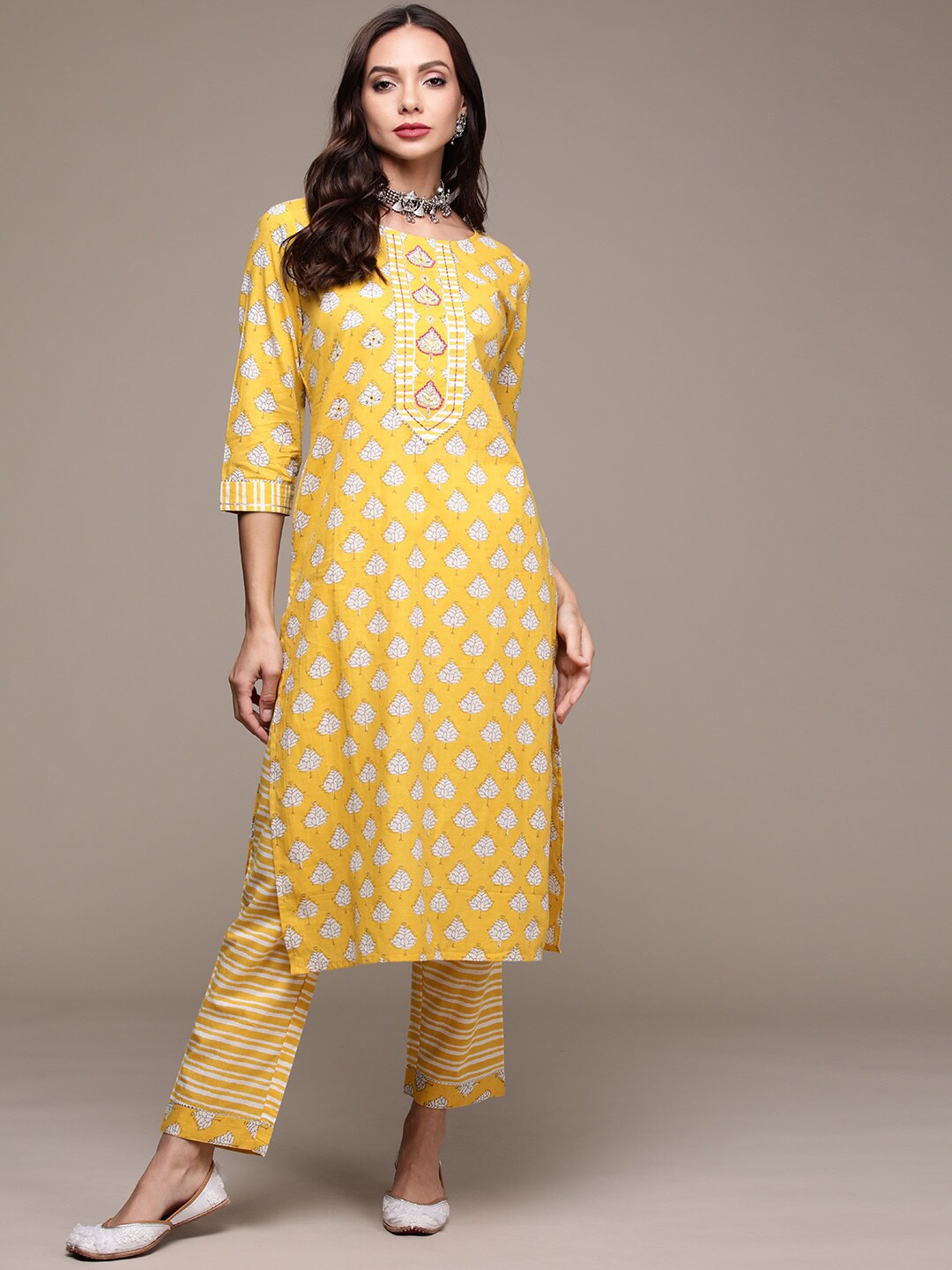 

Anubhutee Ethnic Motifs Printed Thread Work Pure Cotton Kurta with Trousers, Yellow