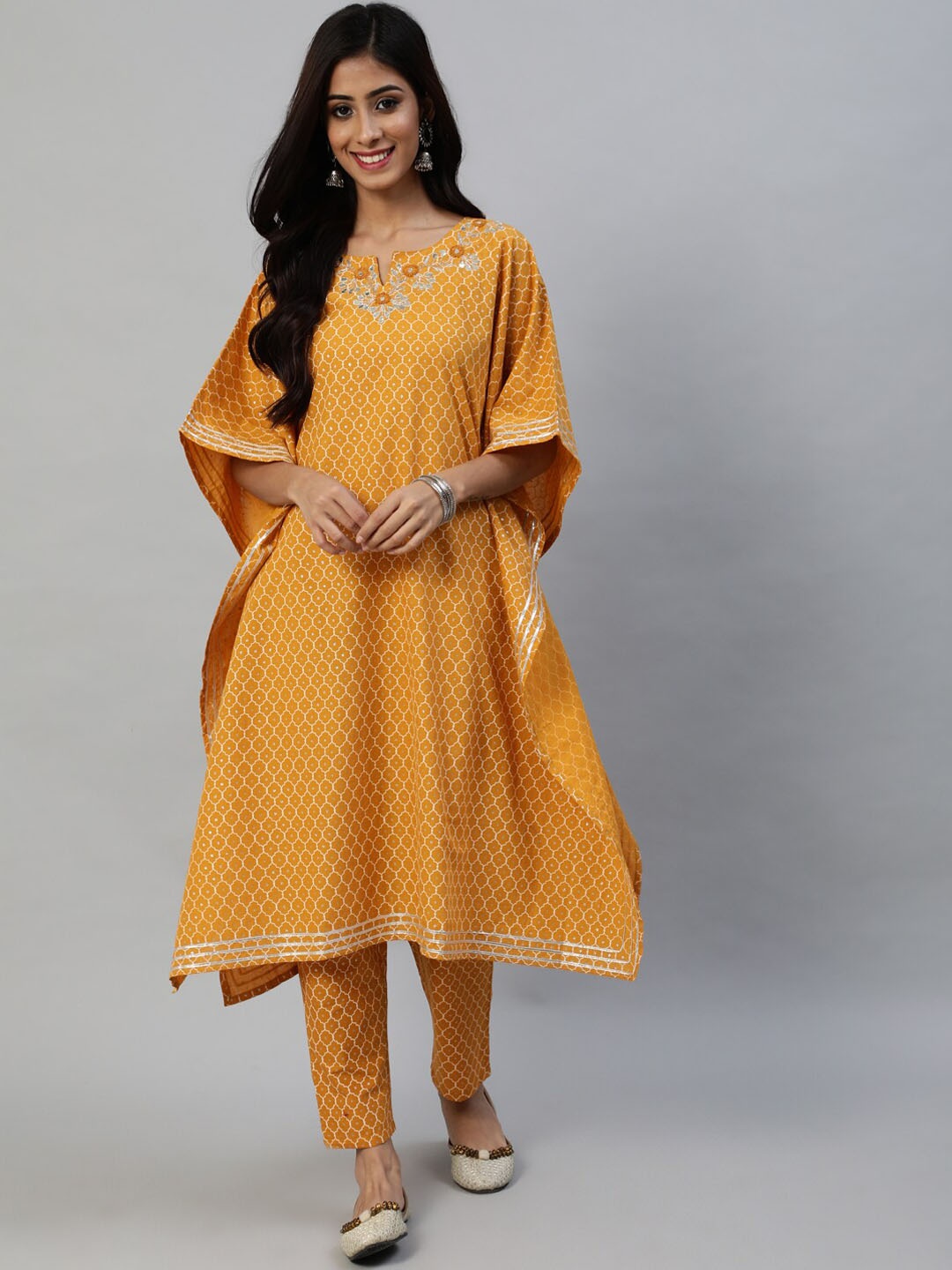 

Anubhutee Printed Pure Cotton Kaftan Kurta With Trouserts, Mustard