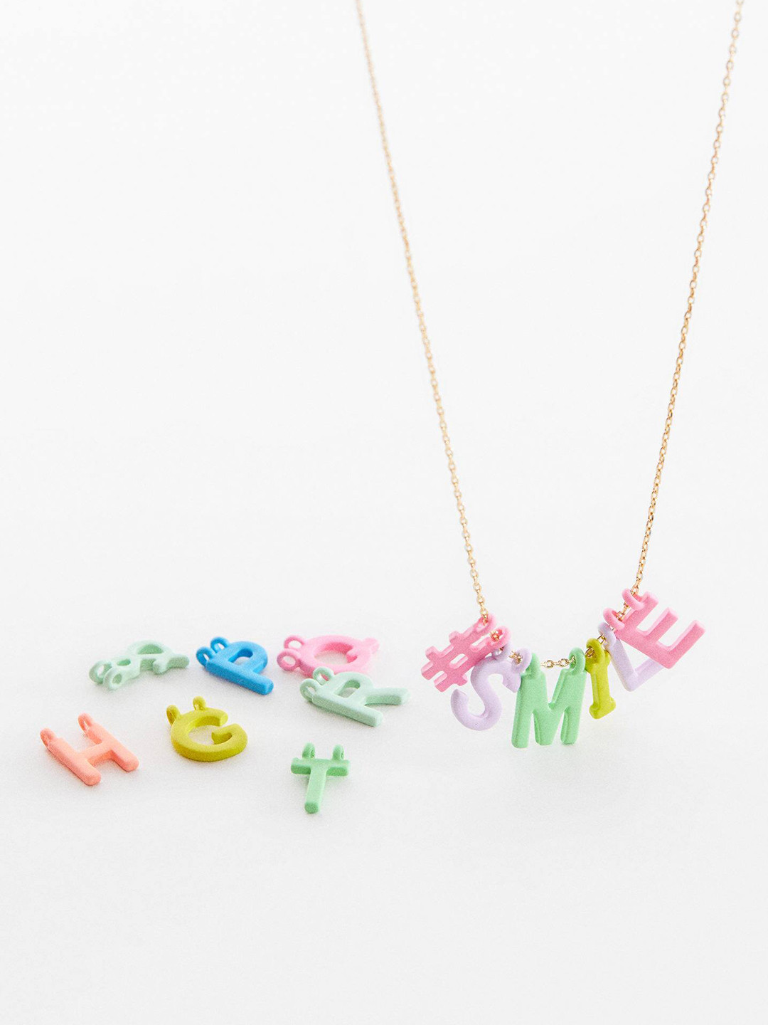 

Mango Kids Girls Smile Necklace with extra Alphabets, Gold