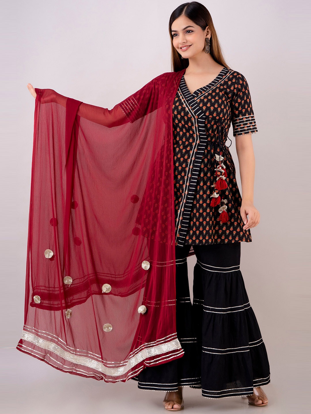 

OMASK Floral Printed Gotta Patti Angrakha Kurta With Sharara & Dupatta, Black