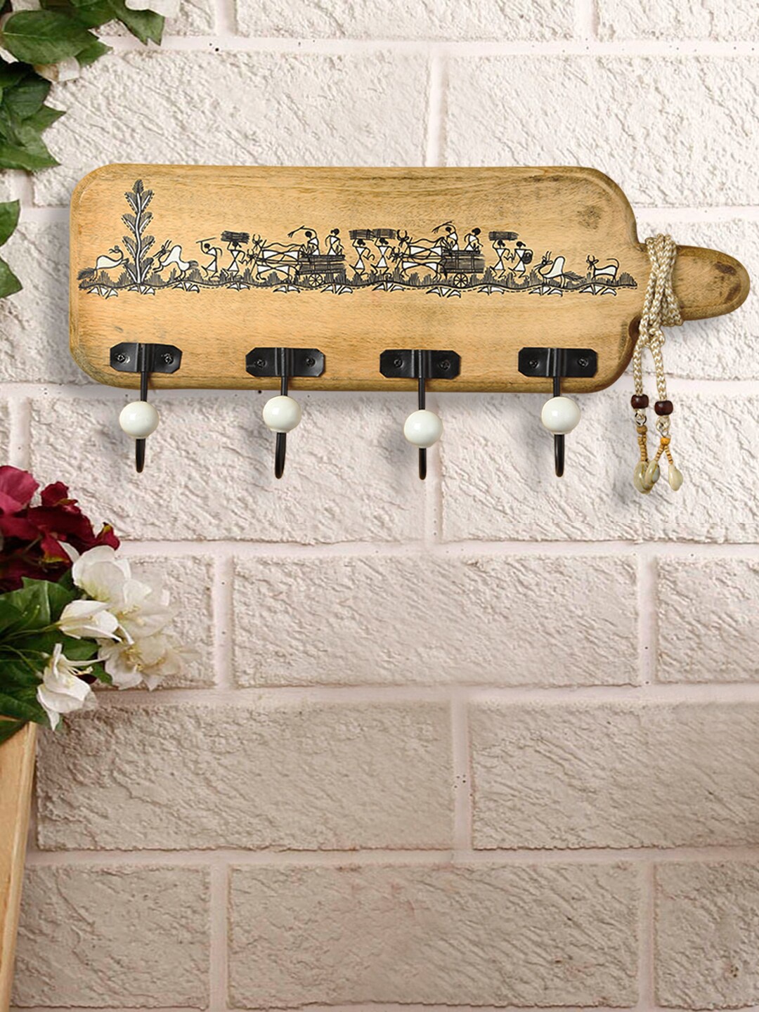 

ExclusiveLane Whitewood Brown Canvas Warli Painting & Jute Dori Cloth Hanger