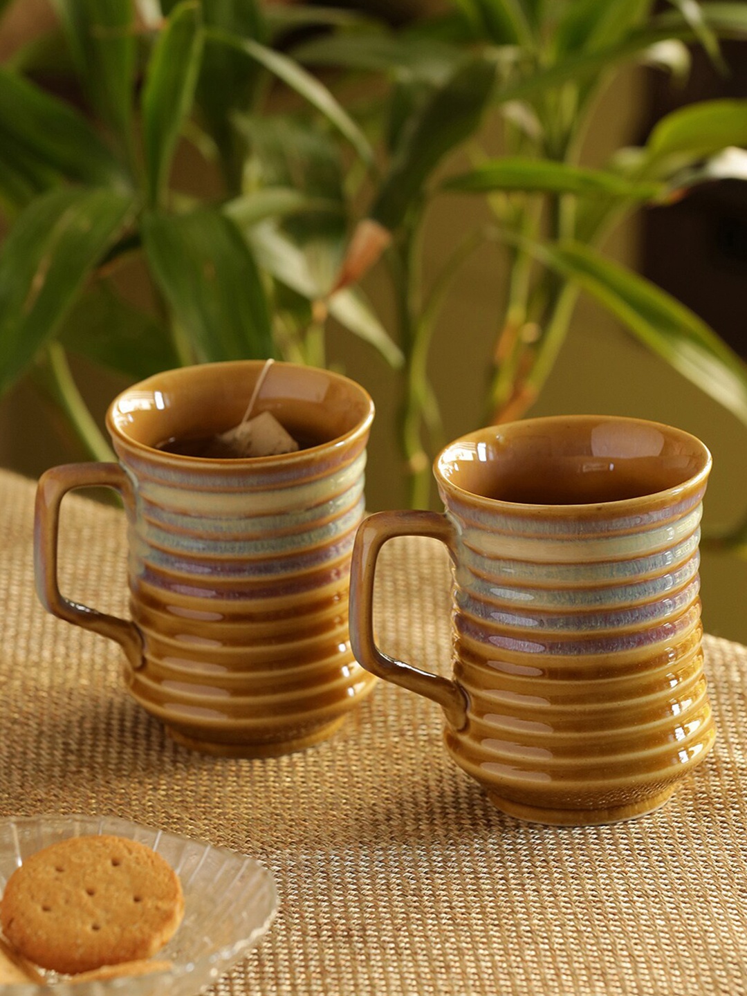 

ExclusiveLane Rings in the sky Mustard Yellow & Off White 2 Pcs Ceramic Mugs 350 ml Each