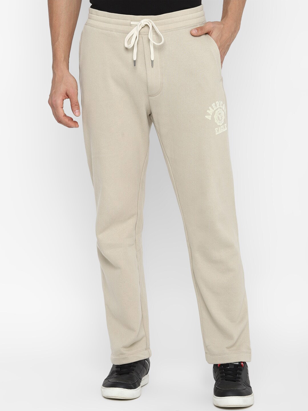 

AMERICAN EAGLE OUTFITTERS Men Brand Logo Printed Regular Fit Mid-Rise Track Pants, Beige