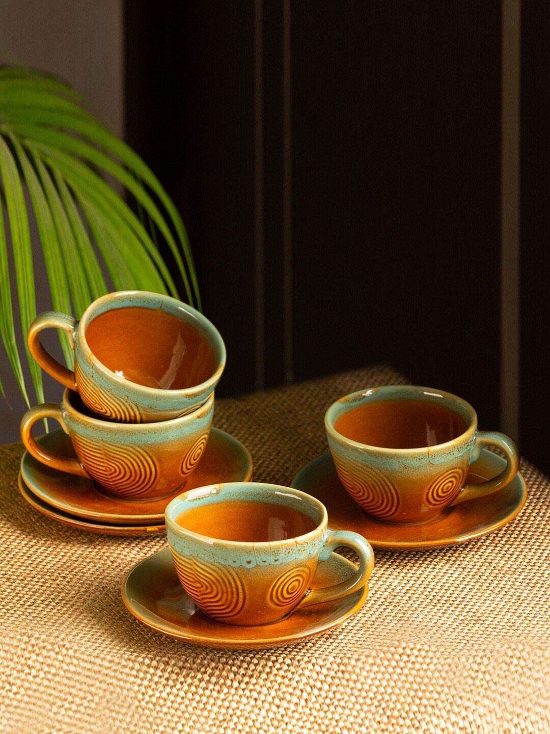 

ExclusiveLane Peacock Boulevard Brown & Sea Green 8 Pcs Textured Cups & Saucers 180ml Each