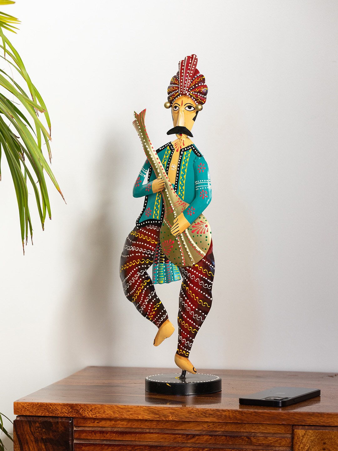 

ExclusiveLane Blue & Brown Rajasthani Sitar Musician Showpiece