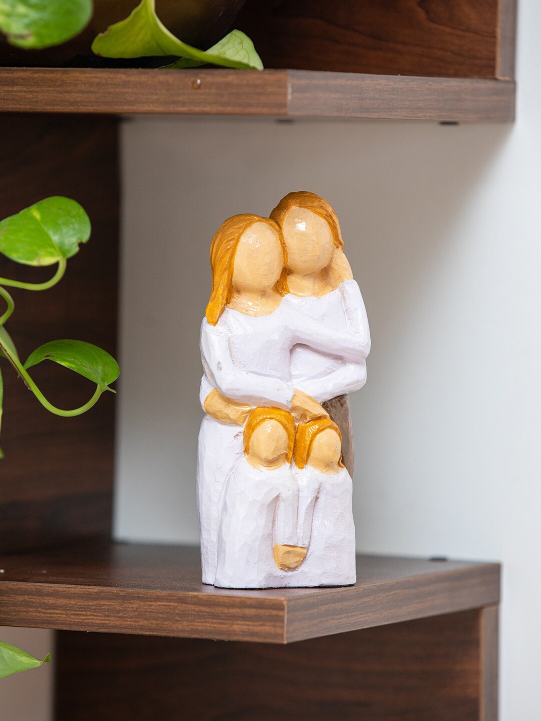 

ExclusiveLane White & Tan Colored Wooden Familyhood Memories Figurine Showpiece