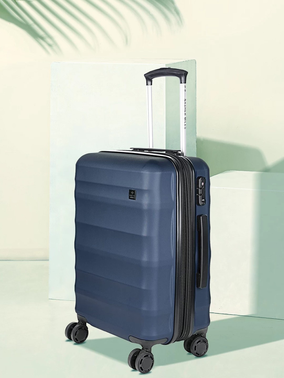 

Nasher Miles Textured Hard-Sided Medium-Size Trolley Bag, Blue