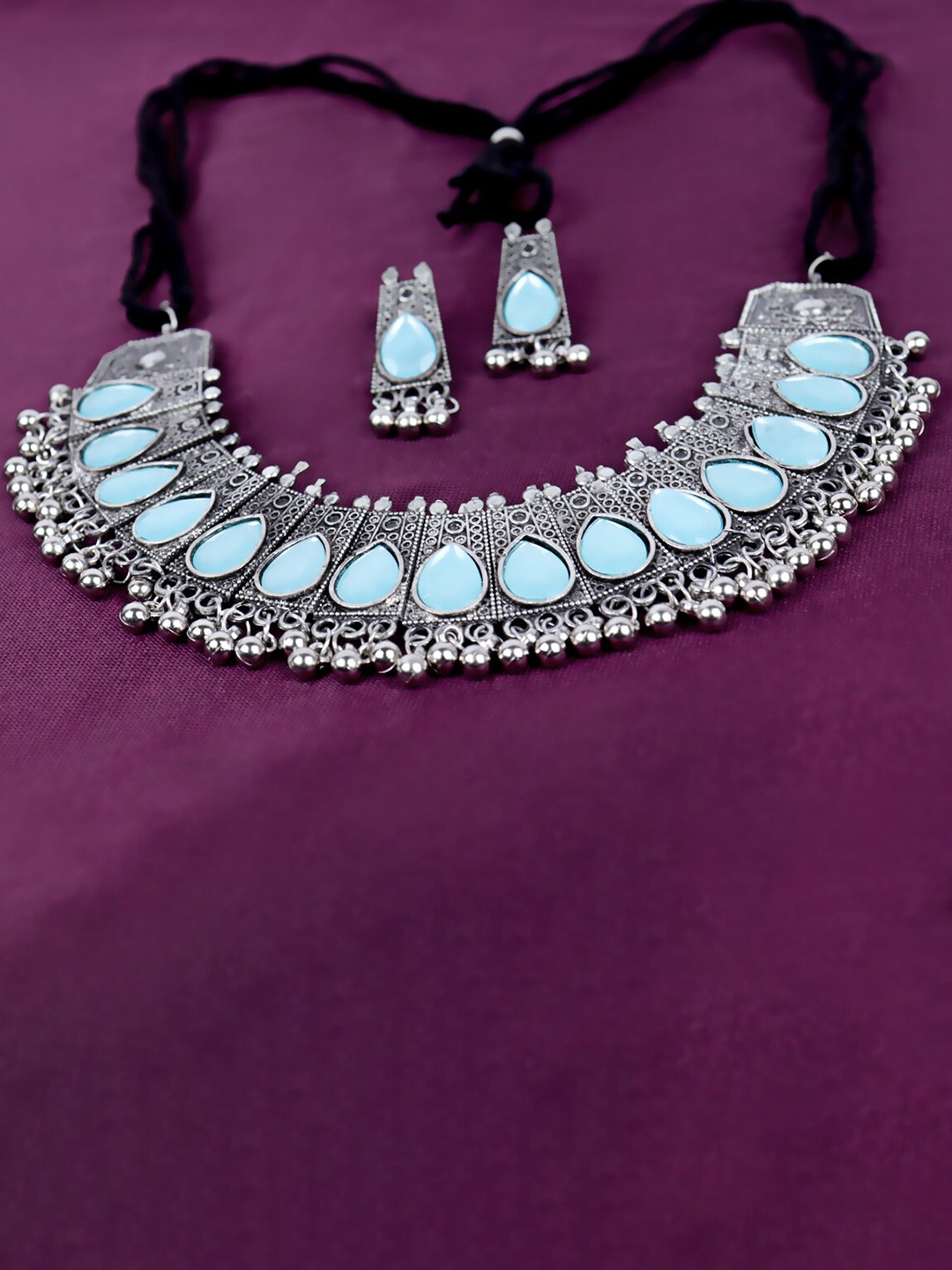 

VAGHBHATT Oxidised Silver Plated Stone Studded With Ghunghroo Jewellery Set, Blue