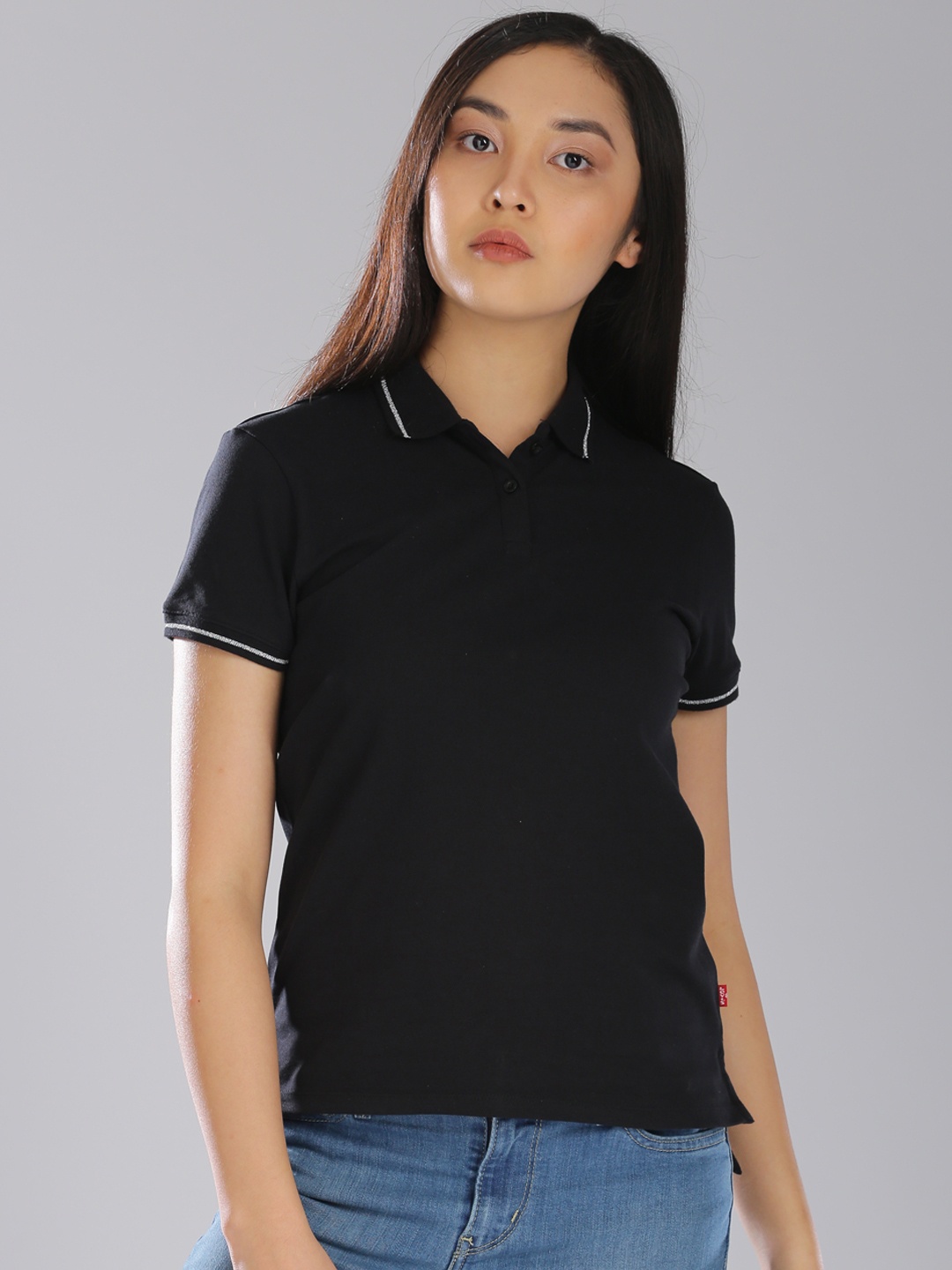 

Levis Women Black Solid Polo T-shirt